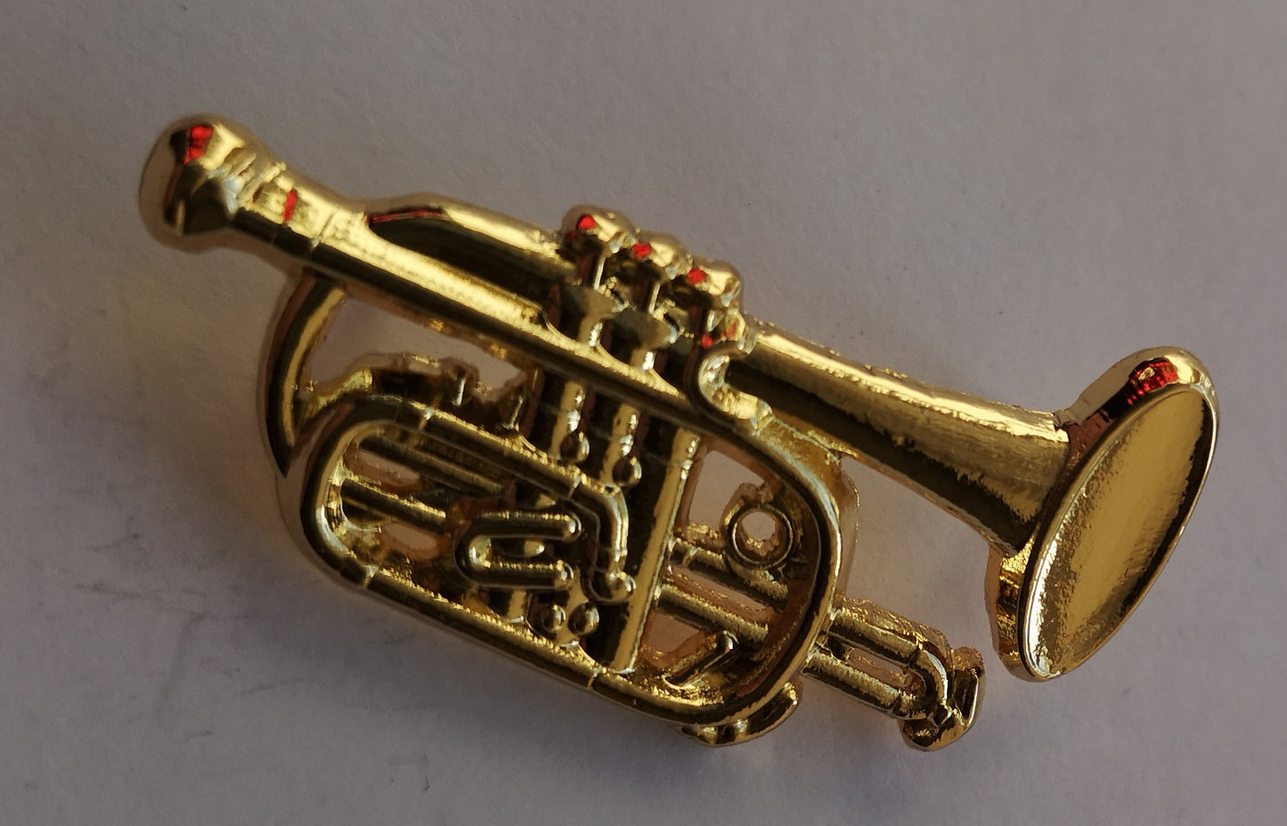 Polished Cornet gold-plated pin badge image 1