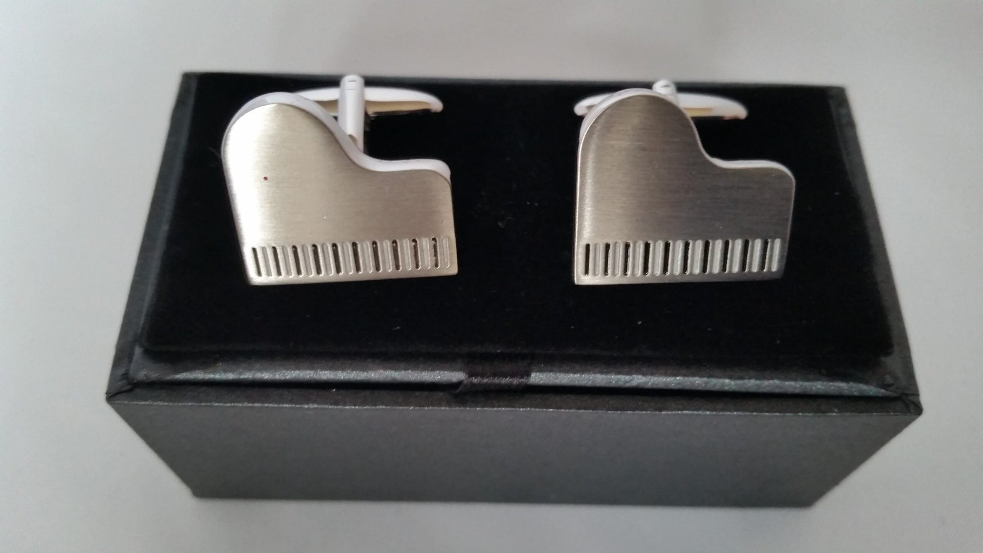Grand Piano top shaped matt silver-plated torpedo cufflinks in padded gift box image 1