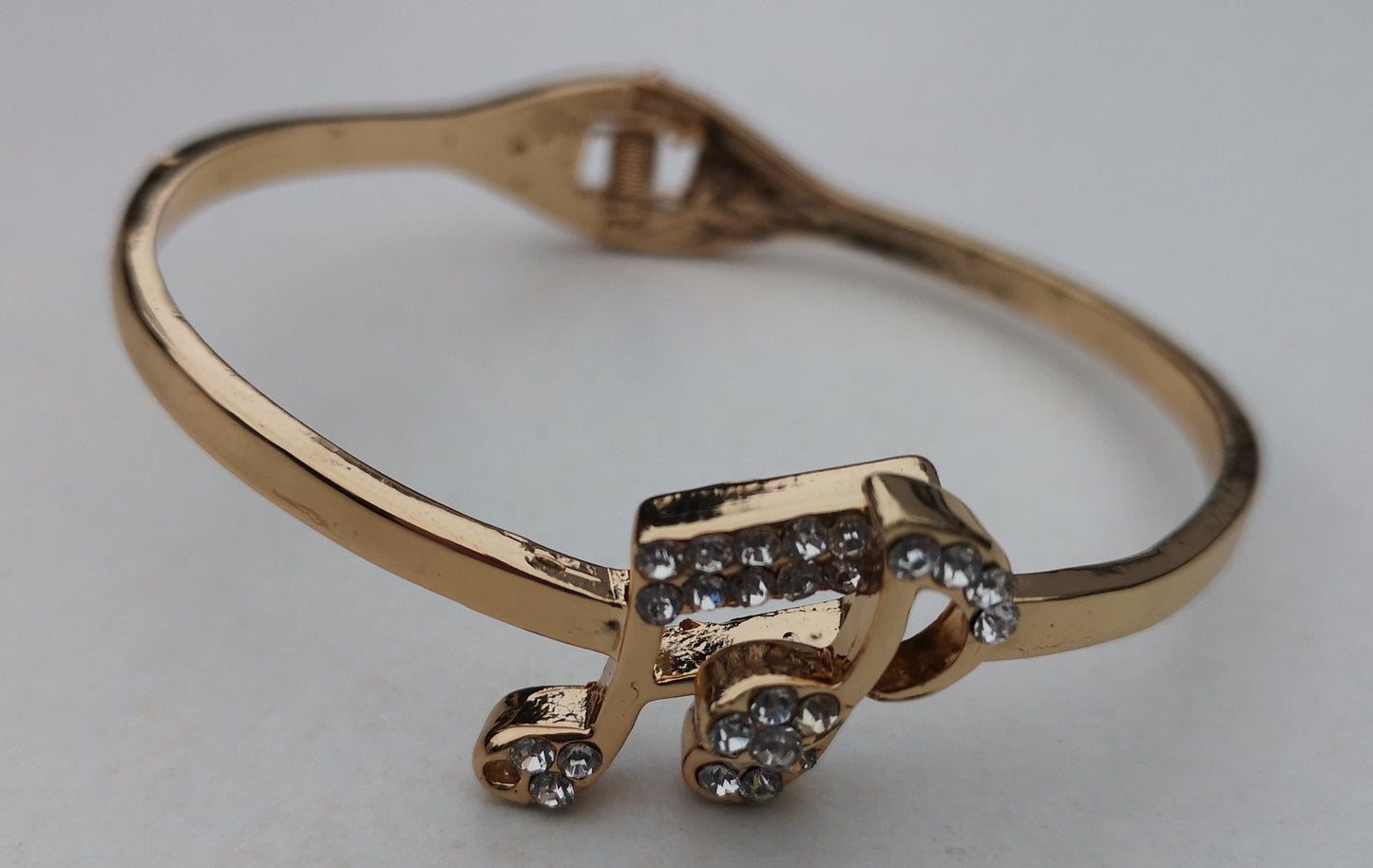 Quaver Music Notes clear-stoned diamante crystal gold-plated hinged bangle image 1