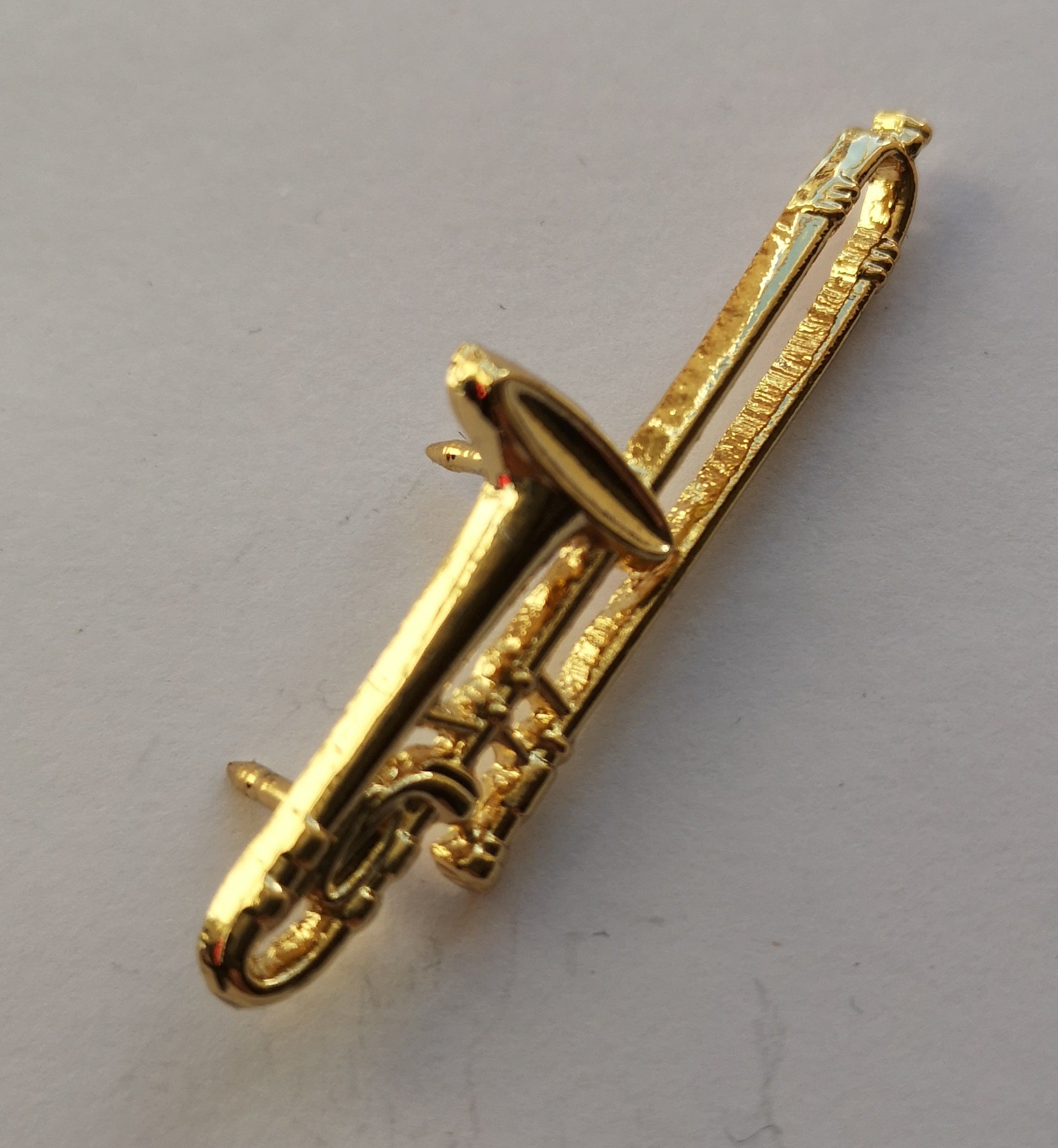 Polished Trombone gold-plated pin badge image 1
